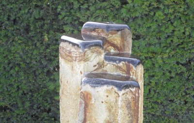 Basaltsäulenpaket Köpfe poliert - eine Säule gebohrt